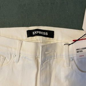 Never worn white detailed express stretch jeans